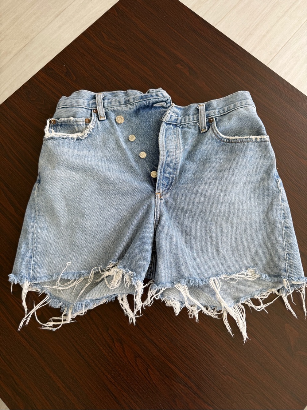 AGOLDE Criss Cross Shorts Light Blue Distressed High-Waist Denim